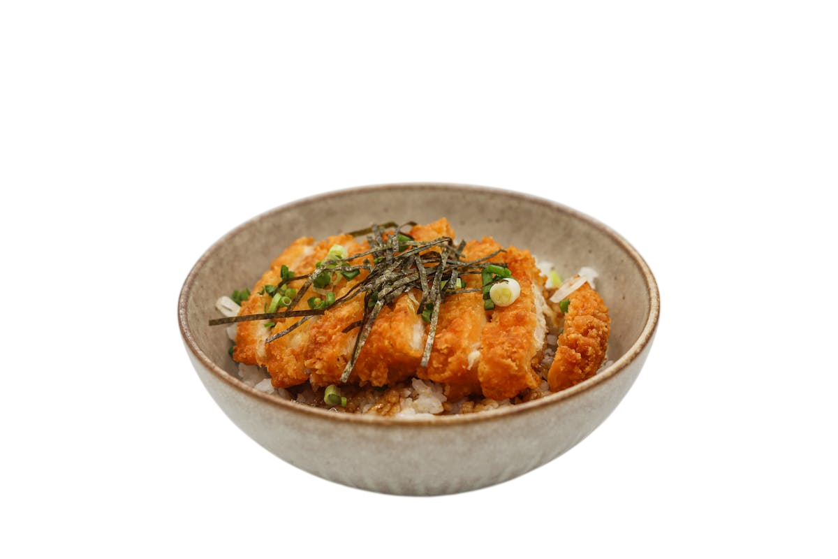 Air fryer, rice cooker, and pot with a bowl of food